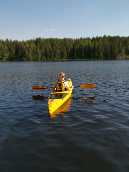 Outdoor activities, kayaking on the lake.