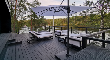 Pool and sitting area at Villa Glass House sauna terrace